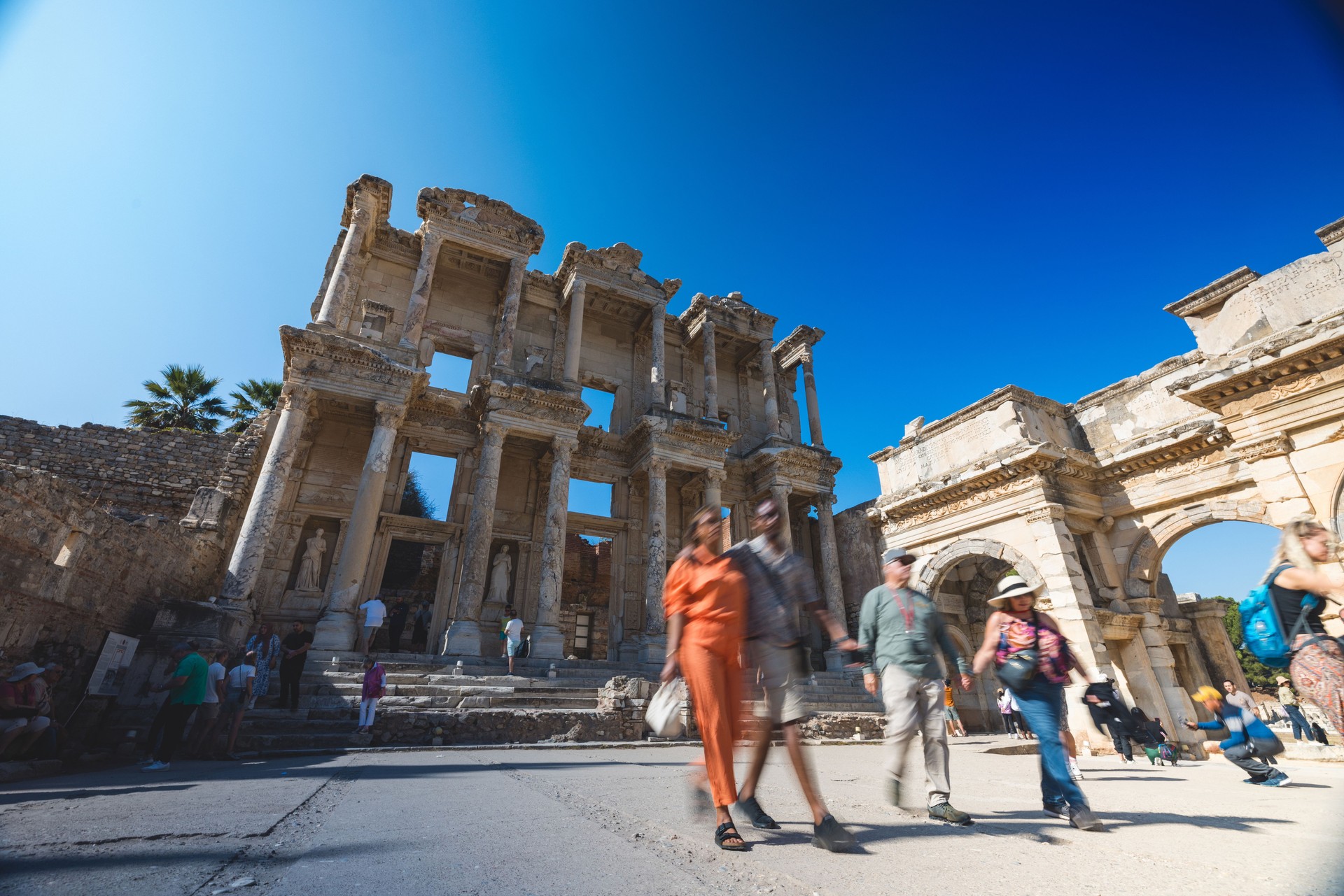 Tourists Exploring Ancient Library of Celsus Ruins in Ephesus